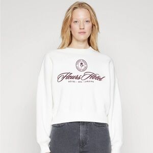 White Abercrombie and Fitch Soft A&F collection sweater.